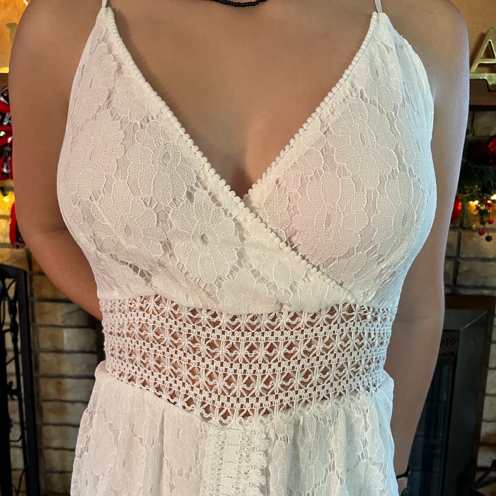 White dress with shorts. Only worn to try on. Size M